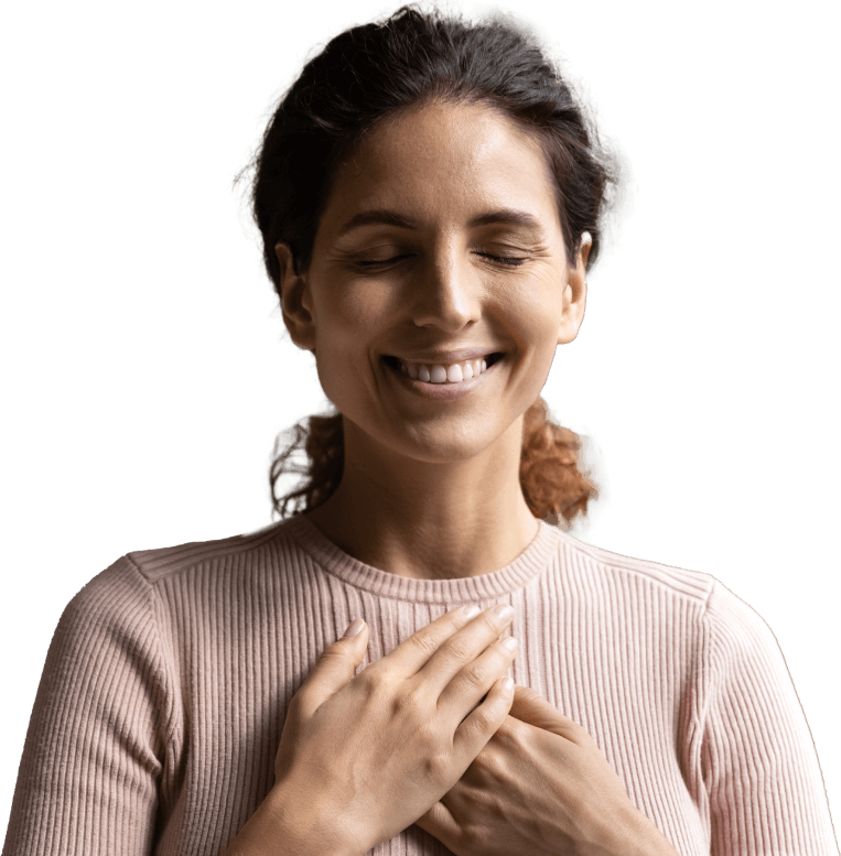 joyful female smiling with hands on chest